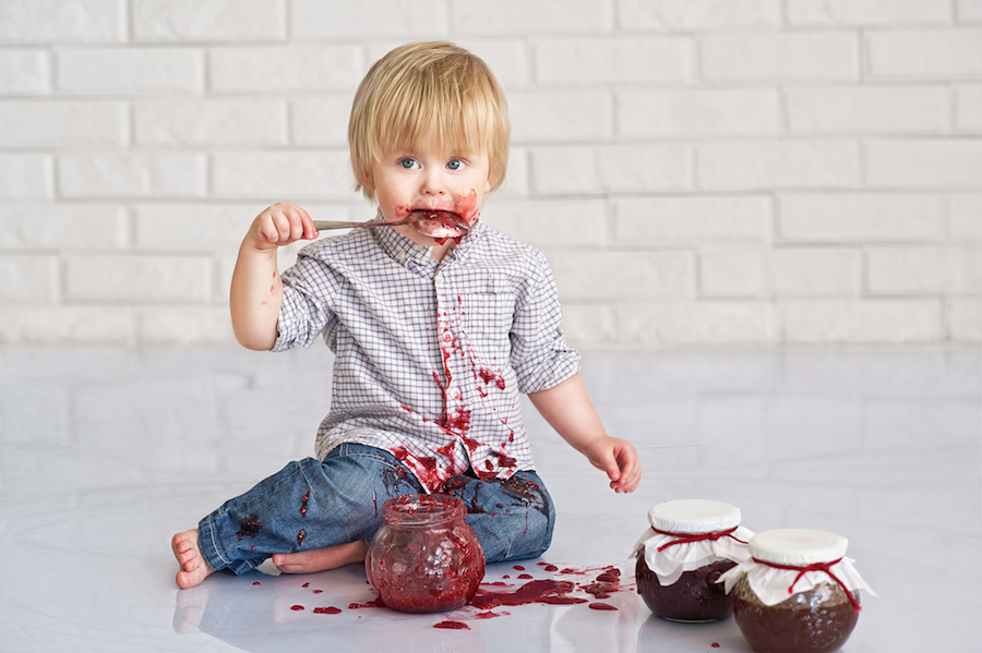 Boy eating jelly